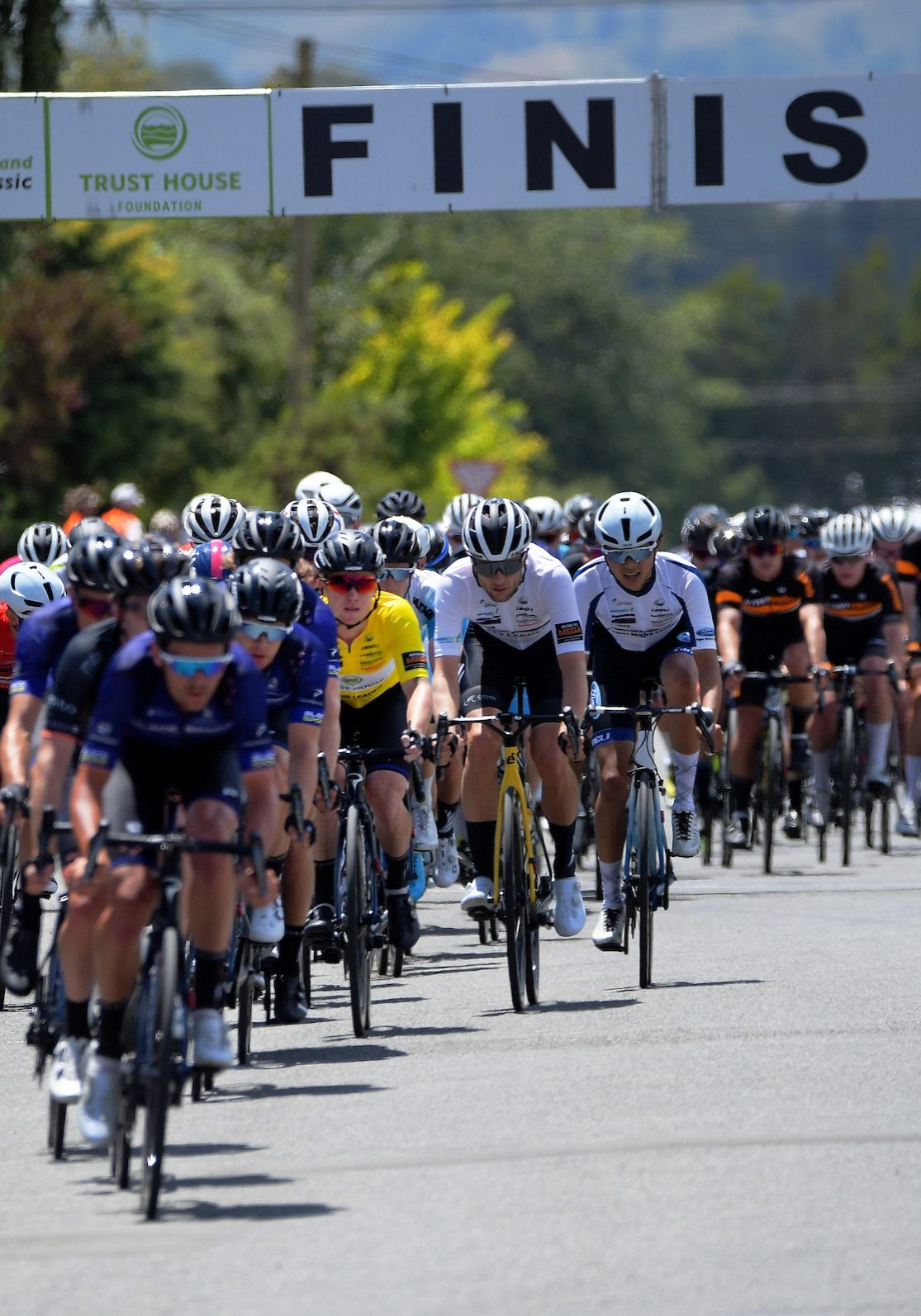 The peloton begins the final lap. Gladstone-Martinborough circuit - Stage Three of 2021 NZ Cycle Classic UCI Oceania Tour in Wairarapa, New Zealand on Friday, 15 January 2021. Photo: Dave Lintott / lintottphoto.co.nz